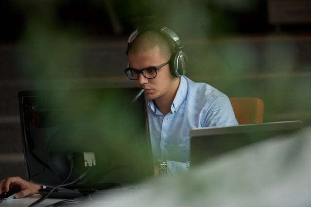 startup business, software developer working on computer at modern office.jpeg